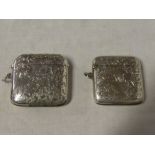 A late Victorian silver rectangular curved vesta case with hinged lid and engraved decoration,