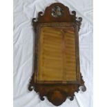 A George III mahogany and figured walnut rectangular wall mirror with Prince of Wales feathers gilt