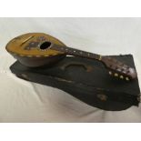 An old Italian mandolin by "Il Globo" with tortoiseshell mounts in fitted case