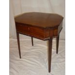 An Edwardian shaped-rectangular mahogany work box on square tapered legs