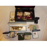 A jewellery box containing a quantity of various costume jewellery, silver jewellery,