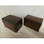 An early 19th Century inlaid mahogany rectangular tea caddy (minus interior fittings) enclosed by a