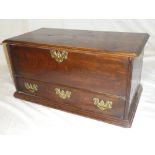 A small 18th Century oak mule chest with compartment enclosed by a hinged lid above base drawer