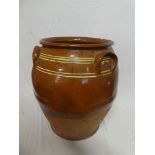A large old part glazed terracotta preserving jar,