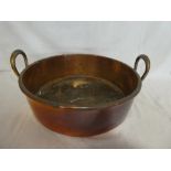 A 19th Century copper circular two handled preserve pan