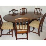 A mahogany dining suite comprising six various 19th Century mahogany dining chairs with rail backs
