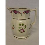 An 18th Century china octagonal tapered jug with painted floral decoration and angular handle,