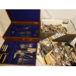 An oak part canteen of silver plated table cutlery together with a large selection of miscellaneous