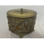 An unusual 19th Century silver plated on copper oval table jar and cover with raised classical