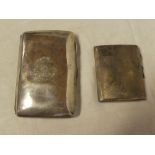 A large silver rectangular cigarette case with engraved decoration,