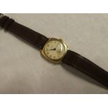 A gentleman's 9ct gold wristwatch by Fillans of Huddersfield with leather strap