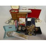 A large selection of various costume jewellery including necklaces, brooches,