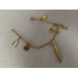 A 9ct gold charm bracelet set six small charms