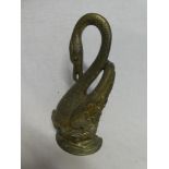 A good quality brass doorstop in the form of a swan,