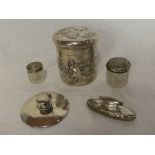 An Edward VII silver cylindrical toiletry jar decorated in relief with angels faces,