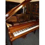 A good quality baby Grand Piano by R Gors & Kallmann of Berlin,