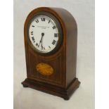 A good quality mantel clock with circular enamelled dial by Sir John Bennett Limited London in