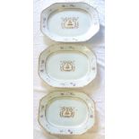 A set of three 18th Century Chinese export armorial graduated rectangular platters,
