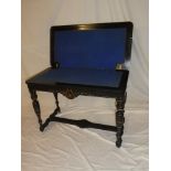A late Victorian burr walnut and ebonised rectangular turn-over top card table with baize lined