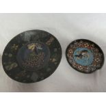 A Japanese Cloisonne enamelled circular charger with Oriental bird decoration on purple and green