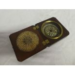 An early 19th Century dry card pocket compass by Springer of Bristol in mahogany folding case
