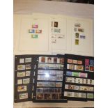 Various stock cards and album pages containing a selection of Jersey stamps,