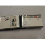 An album containing approximately 60 x GB first day covers,