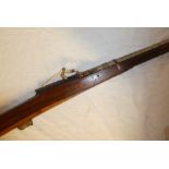 An old Indian matchlock torrador Musket with 48" steel barrel and polished wood stock