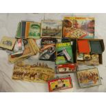Various vintage toys and games including Merit Driving Test game, children's books,