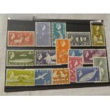 A stock card containing a set of South Georgia 1963-1969 definitive stamps with both £1 values,