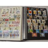 Two stock books containing a collection of GB stamps,