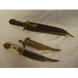 A Syrian dagger with brass mounted bone hilt in brass scabbard and one other modern dagger (2)