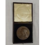 A large bronze 1897 Victorian Jubilee medallion in velvet lined case