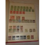 A stock book containing a selection of GB stamps including Penny Reds, surface printed, covers,