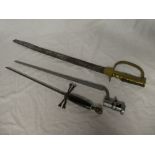 A copy Baker rifle bayonet with brass hilt,