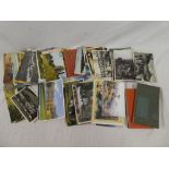 A selection of various black & white and coloured postcards together with postcard booklets,