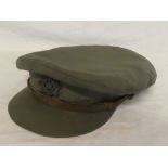 A First War 1918 Officers pattern trench cap of the Devonshire Regiment with bronze cap badge and
