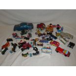 A metal friction powered Sedan car, various other die-cast cars,