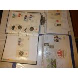 Three albums containing a collection of Wales postal history including stamps, first day covers,