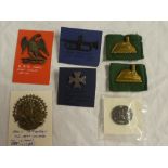A 19th Century brass US Army eagle insignia; Confederate States of America brass eagle badge;