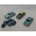Four Matchbox die-cast vehicles including A35, Anglia, motorcycle and sidecar,