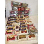 A selection of boxed die-cast vehicles including Days Gone Showman vehicles,