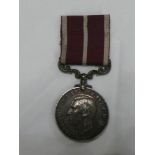 A Meritorious Service medal (GV1R) awarded to Col.Sjt. W.T.Gilley D.C.L.I.