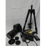 A Nikon F5 camera with Nikon AF Nikkor 80-200mm telephoto lens, additional Nikkor-P auto 1:2.