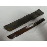 An old jungle issue machete by F W James of Sheffield with 12½" single edged blade in leather