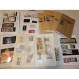 Ten stamp club books containing a selection of mint and used stamps with high catalogue value