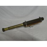 An old brass mounted two draw telescope by Charles Frank of Glasgow on wooden mounting frame