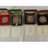 Four cased silver commemorative crowns including 1974 Sierra Leone crown,
