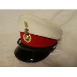 An E11R Royal Marines Plymouth Division Band female musicians' peaked cap with badge