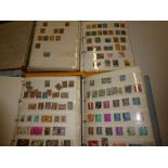 Four albums of various stamps including Eastern Europe, Hungary, Ireland, South America,
